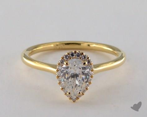 Pear shaped diamond engagement ring yellow gold