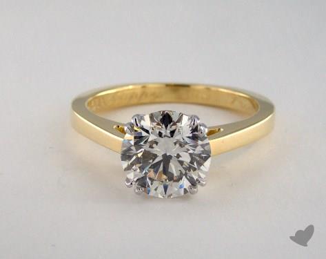 Round solitaire engagement rings yellow gold